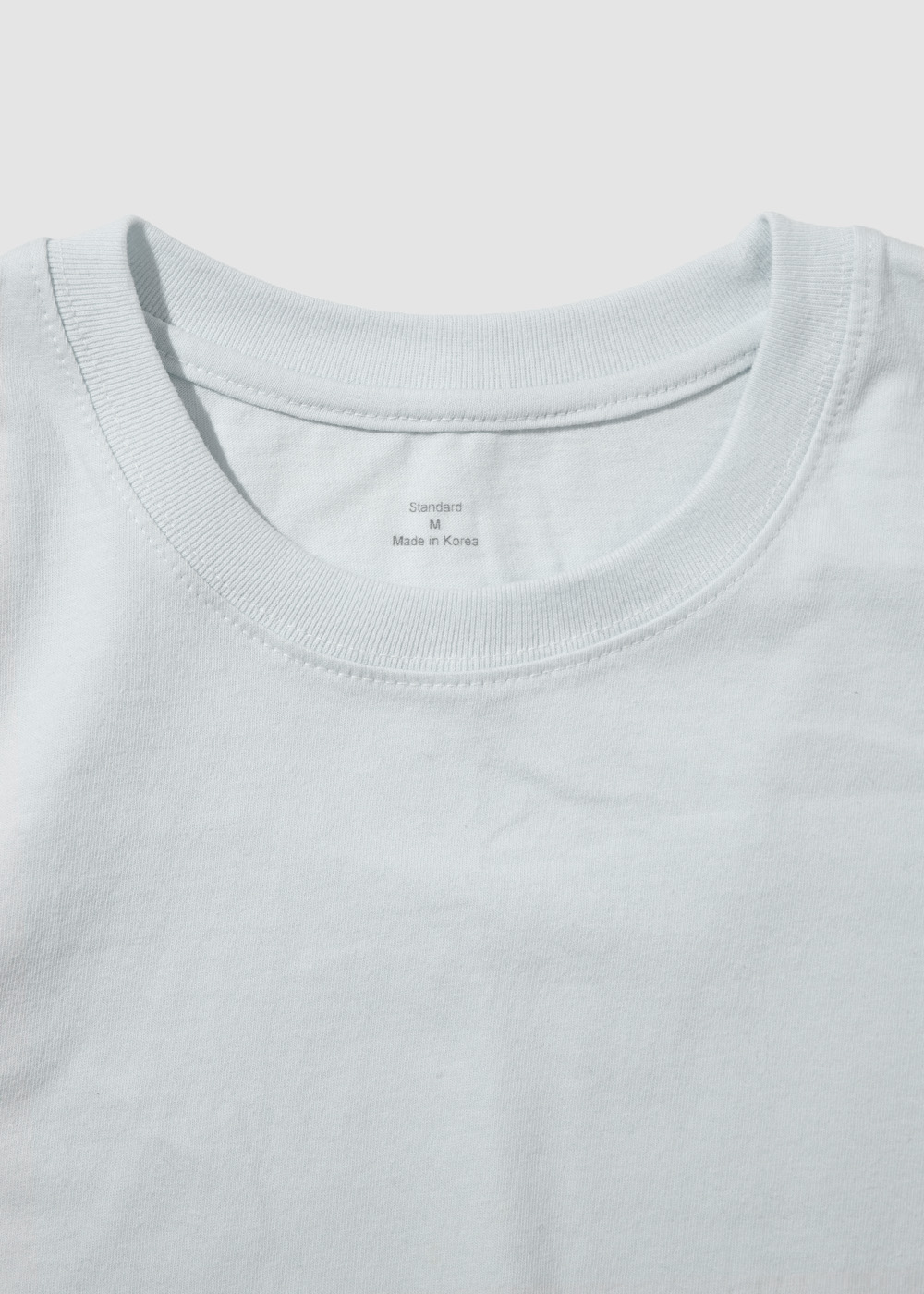 D. Tumbled Carded Cotton 100% 20/1 Single T-shirt _ ice cotton